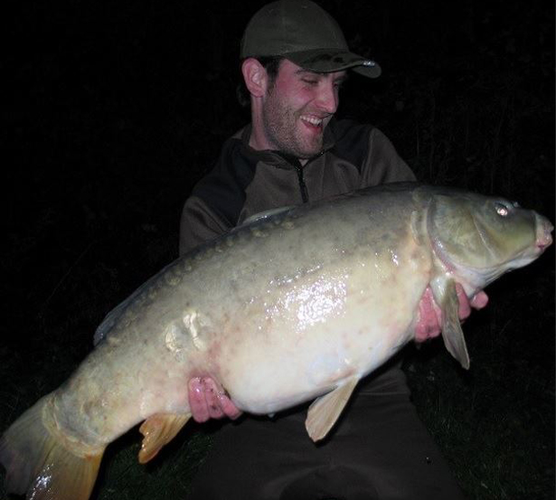 a freezing cold wet winter pit fish - Lewis Thompson 27lb Mirror