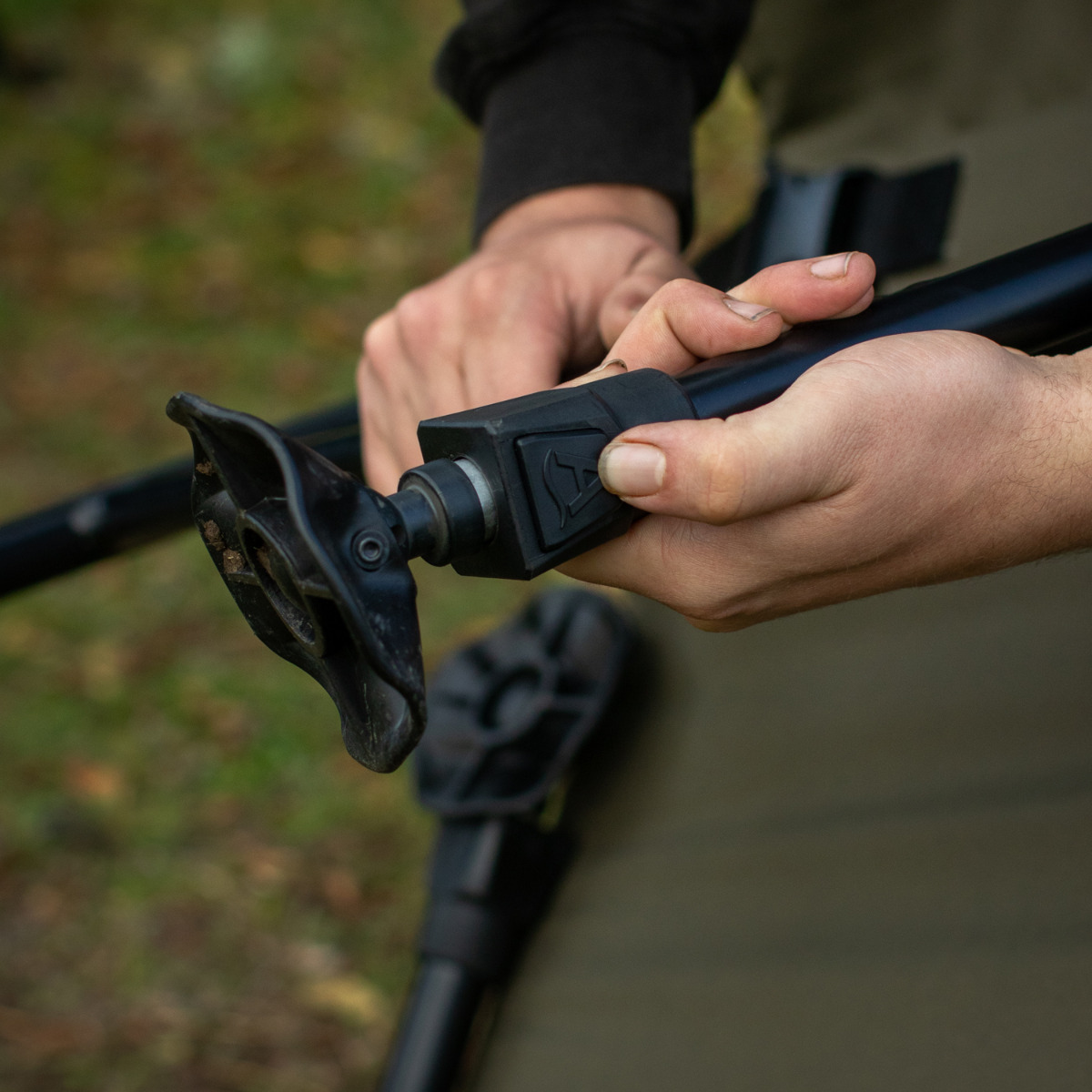 Aqua Longback Fishing Chair Close Up Mud Feet